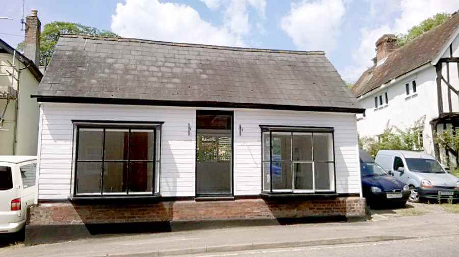 Front elevation of the shop before works started viewed from across the road