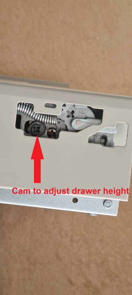 Drawer cam to adjust drawer height.