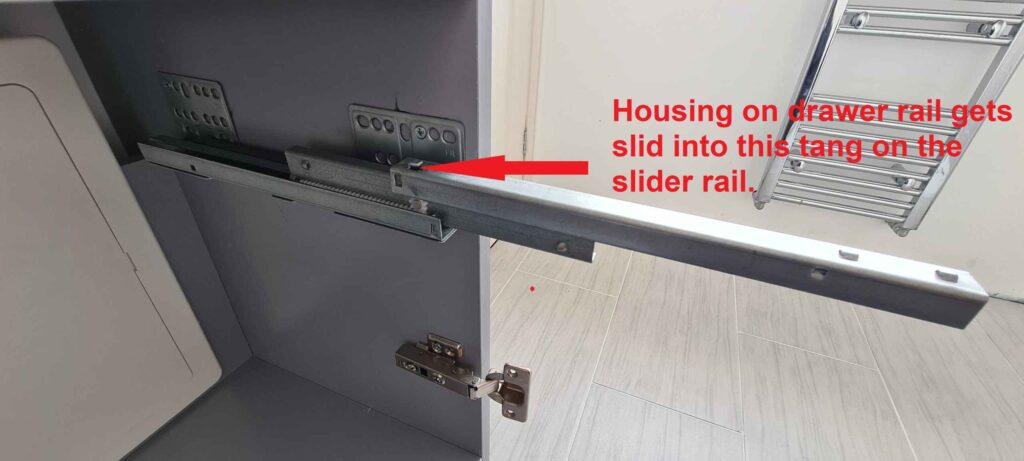 Drawer slider rail showing where it hooks into the drawer rail when positioning the drawer.
