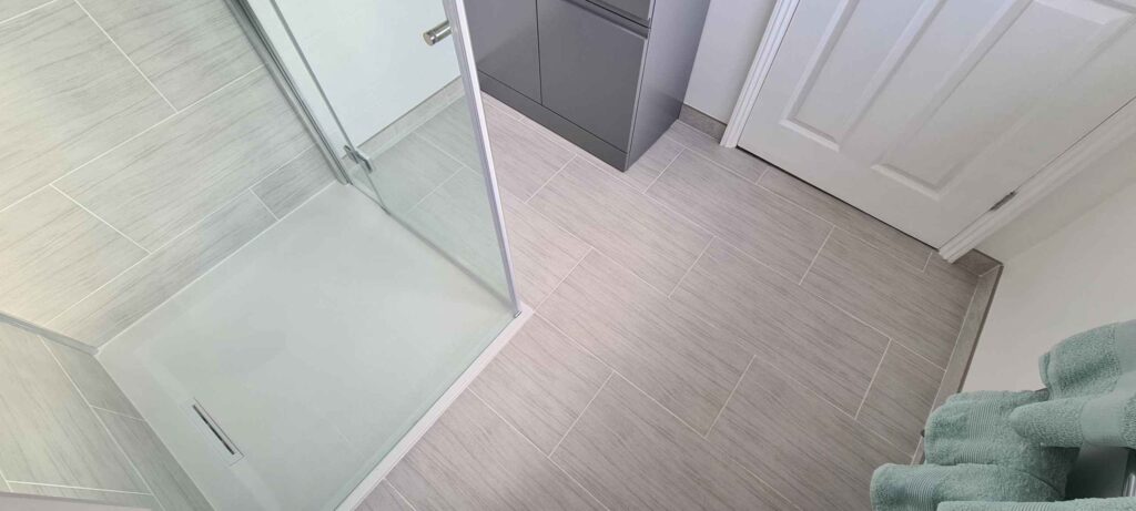 Completion of Ensuite renovation - floor and skirting tile