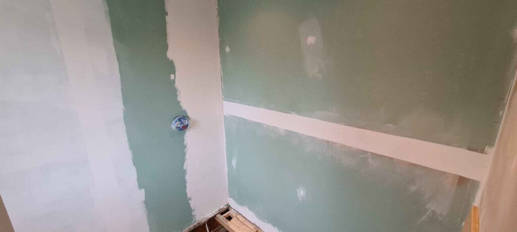 Taping and plastering drywall seems