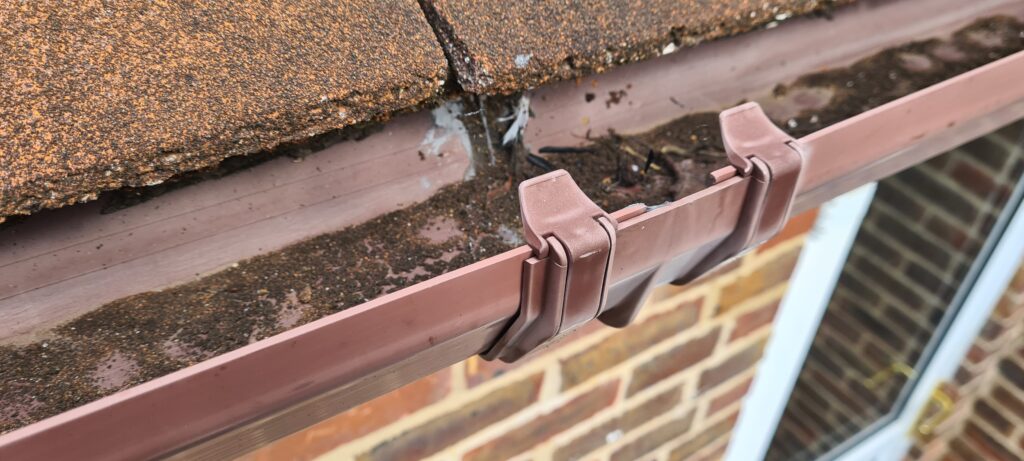 Old guttering brittle and leaky