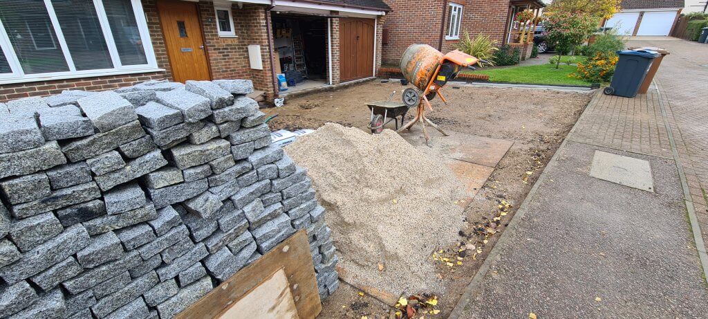 Cobbles moved from one side of the site to the other and one tonne of sand has been delivered