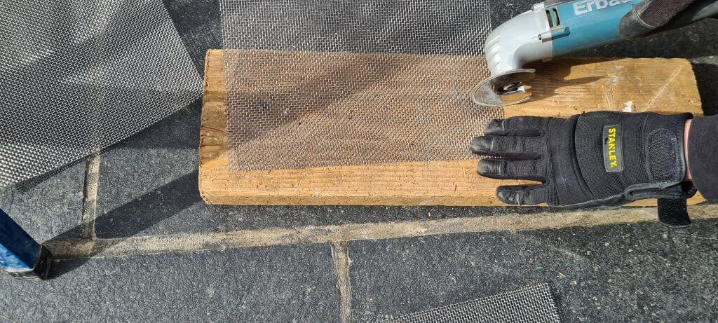Cutting the air hole grating material with a multitool and a diamond edged segmented blade